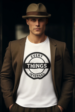 Load image into Gallery viewer, Man wearing a brown fedora hat and brown suit jacket, modeling a white &quot;Every Internal Things&quot; long sleeve t-shirt with a bold black circular graphic design.
